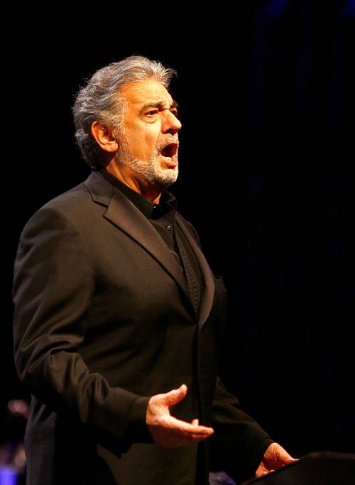 Athens, GREECE: Spanish opera singer Placido Domingo appears during a joint performance at the Athens Panathenaean all-marble stadium, 27 June 2007. The concert was organized to raise funds for the Medecins sans Frontieres charity group's activities in Darfur, Sudan. AFP PHOTO / Aris Messinis (Photo credit should read ARIS MESSINIS/AFP/Getty Images)