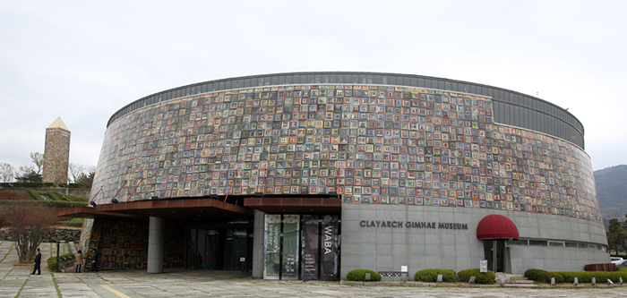 The Clayarch Gimhae Museum, a center for both ceramics and architecture, is covered with 5,000 painted ceramic tiles.